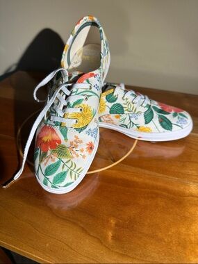 Keds floral canvas tennis shoe.